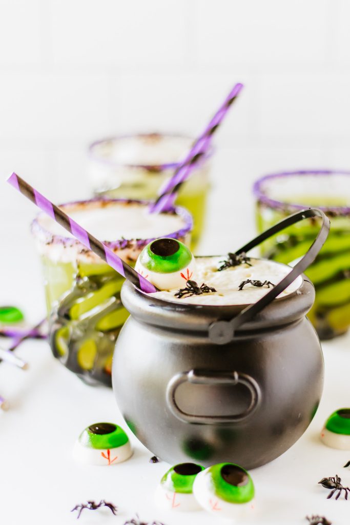 punch in plastic cauldron with straw